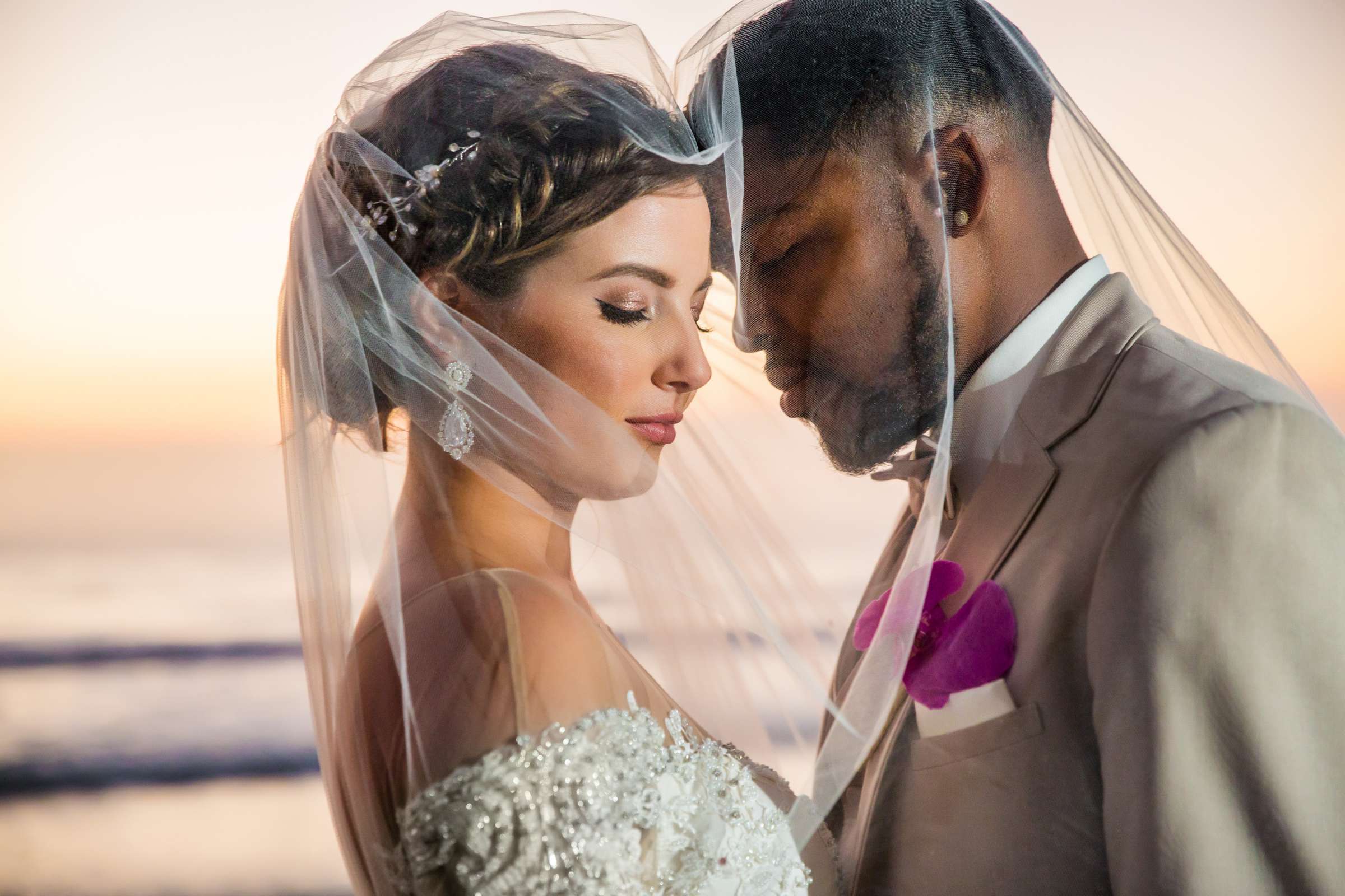 Sunset, Romantic moment, Veil, Photographers Favorite at Scripps Seaside Forum Wedding coordinated by Lavish Weddings, Nicole and Brandon Wedding Photo #1 by True Photography