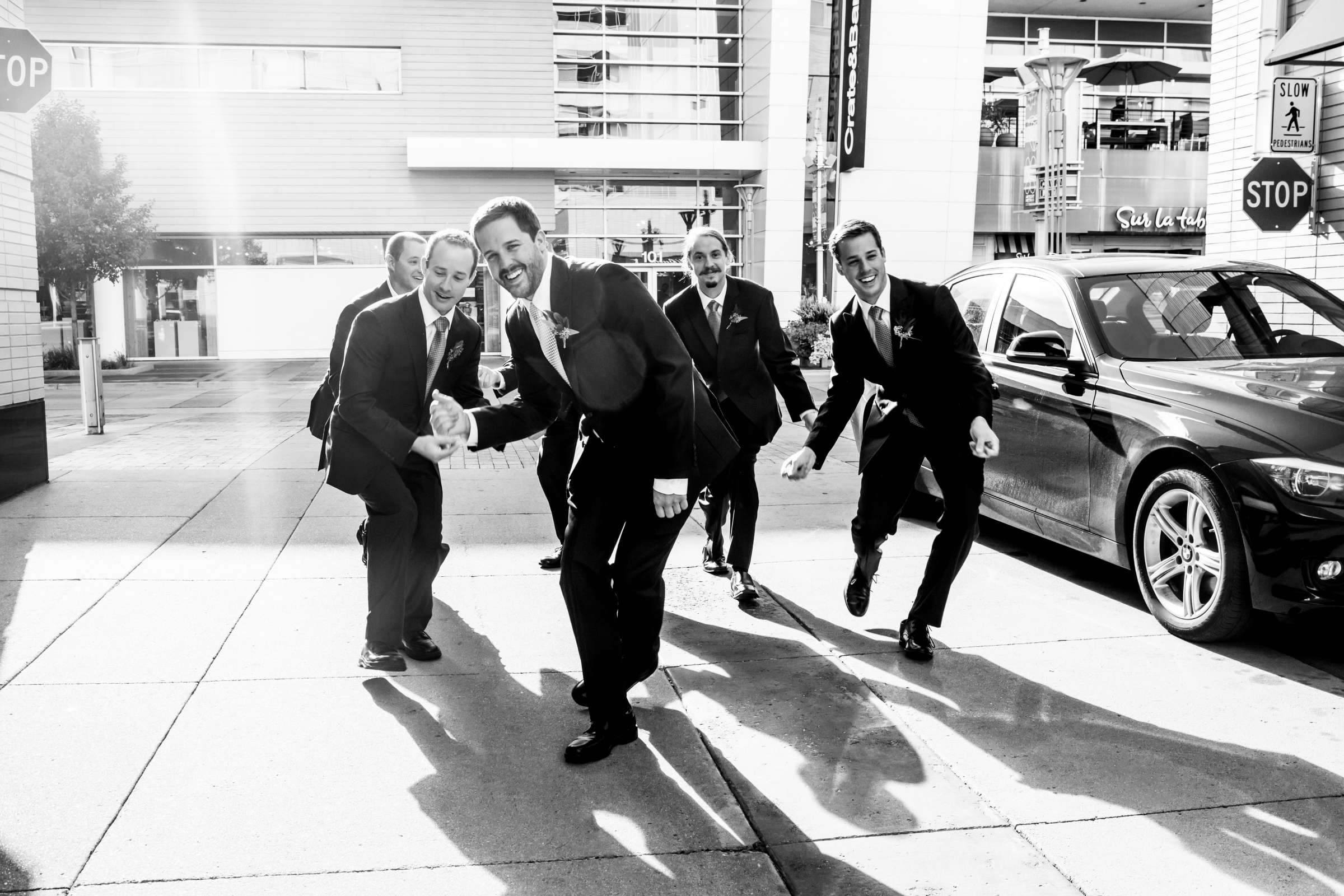 Groomsmen, Black and White photo, Funny moment at JW Marriott Denver At Cherry Creek Wedding coordinated by Sapphire Celebrations, Kelsey and Randy Wedding Photo #15 by True Photography