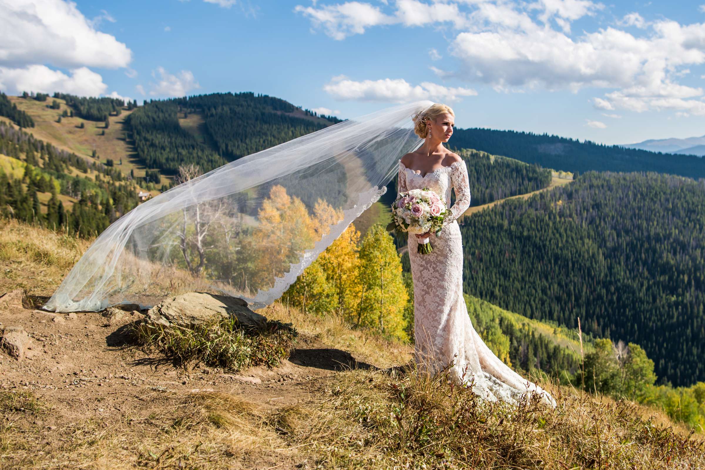 Bride, Mountains at The Vail Wedding Deck Wedding coordinated by Carolyn Moorman, Heidi and Justin Wedding Photo #88 by True Photography