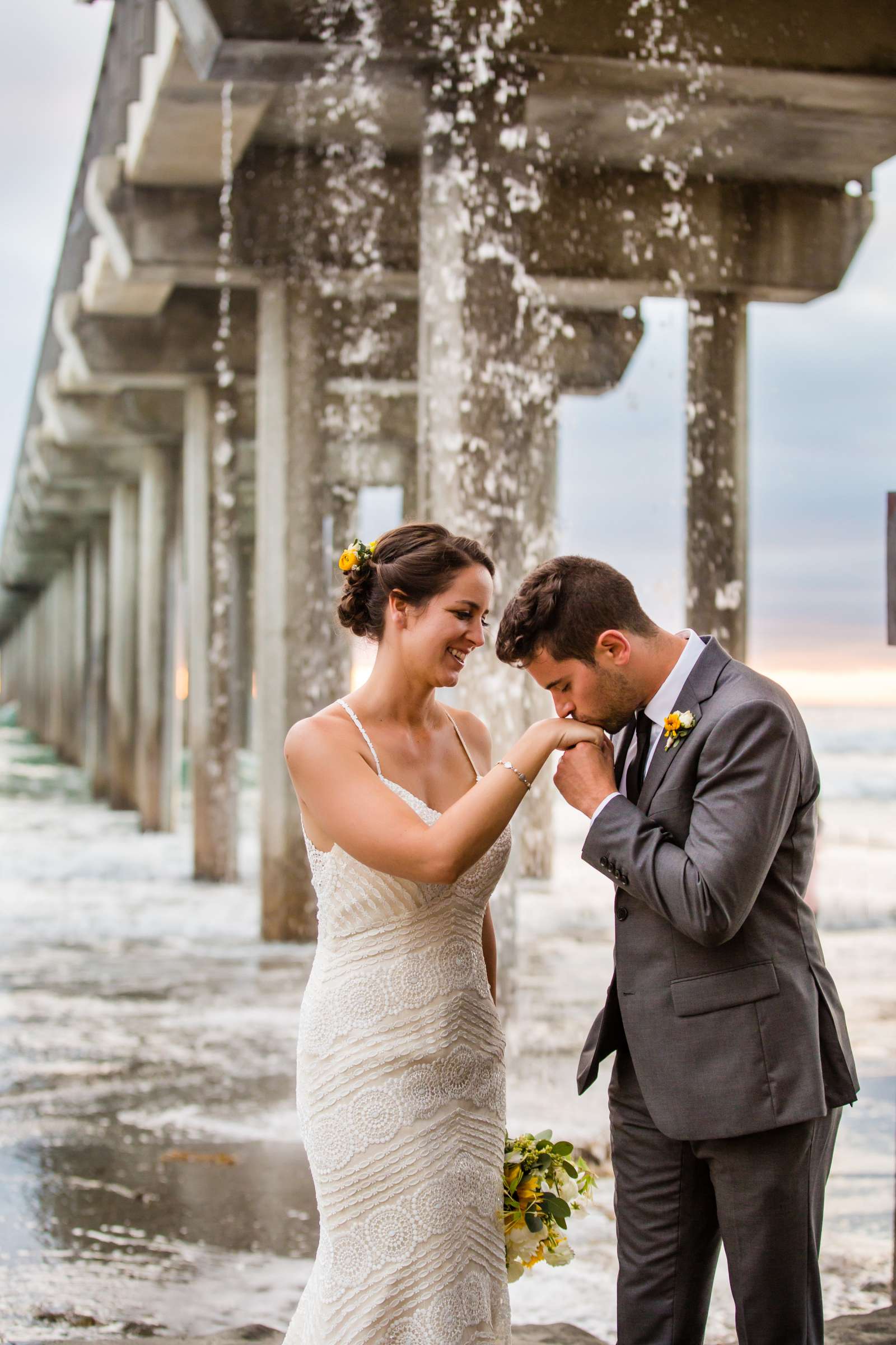 Romantic moment at Scripps Seaside Forum Wedding coordinated by SD Weddings by Gina, Hallie and Alejandro Wedding Photo #2 by True Photography